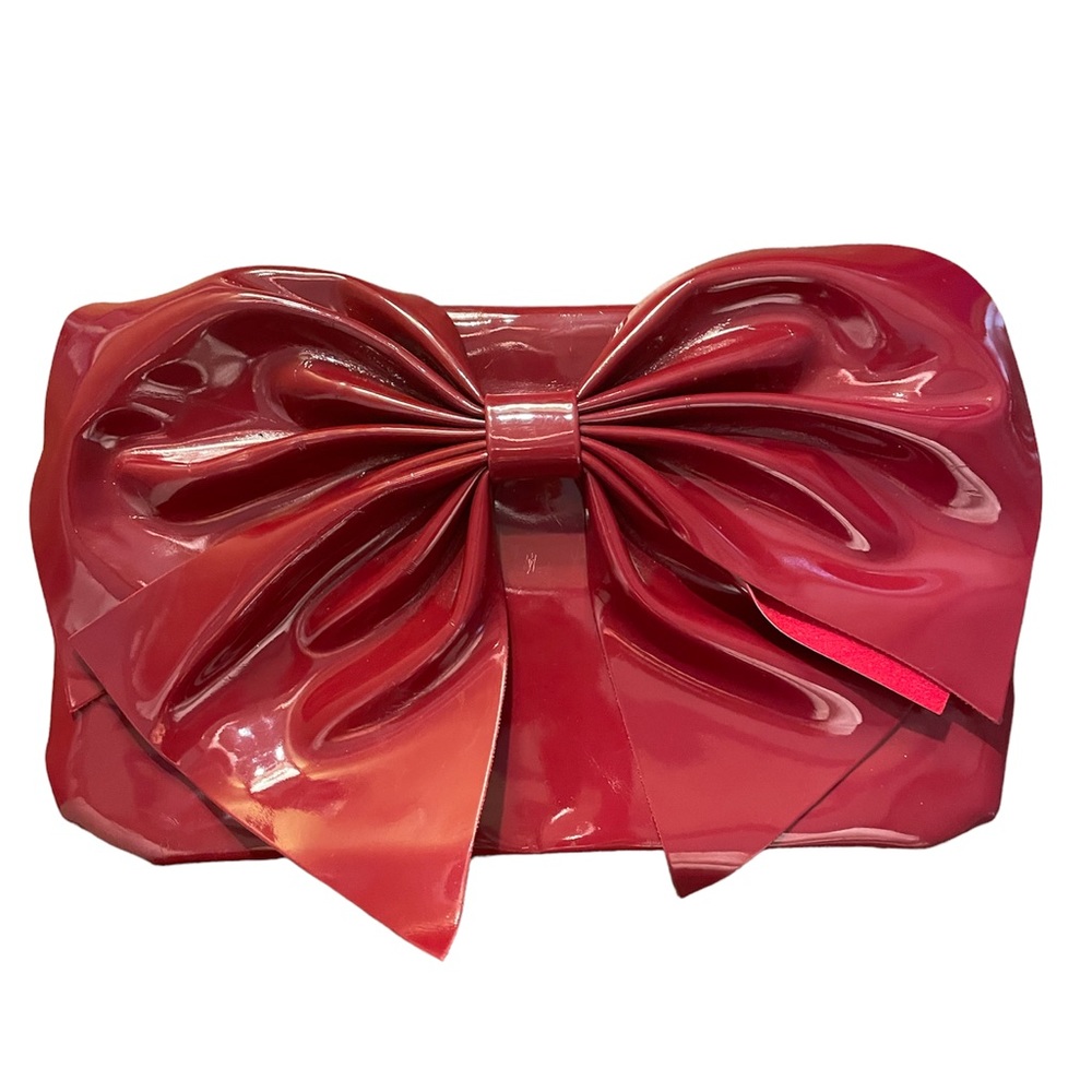Never used, red bow clutch!